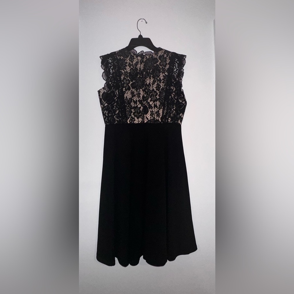 Formal dress with lacing detail.
